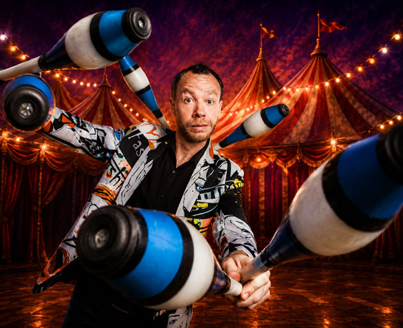 Comedian juggler James Bustar performing live