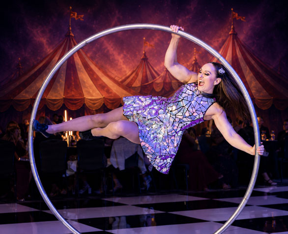 Circus aerialist Kylie Simpson performing cyr wheel